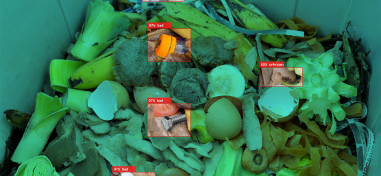 IDS industrial cameras recognise plastic waste as foreign matter between organic waste in an open container.