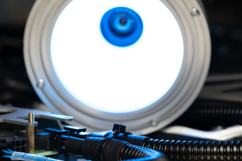 The control unit takes photographs and evaluates characteristic by characteristic