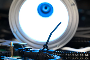 The control unit takes photographs and evaluates characteristic by characteristic