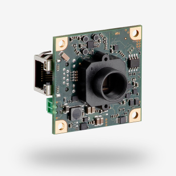 uEye LE board level camera against a grey background.