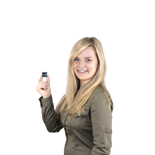 IDS employee holds IDS camera in her hand.