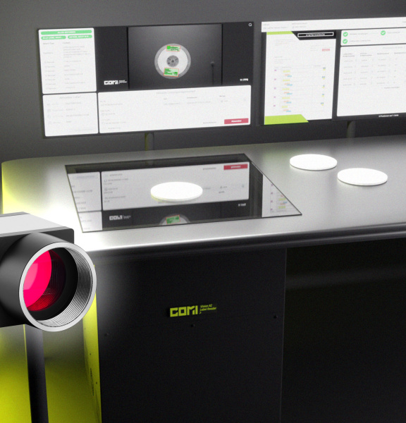 COMI Label Reader as a desktop scanner, with three yellow light strips on the left and an uEye camera in front