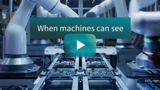 Robotic arms, a play button for the video and the caption: When machines can see