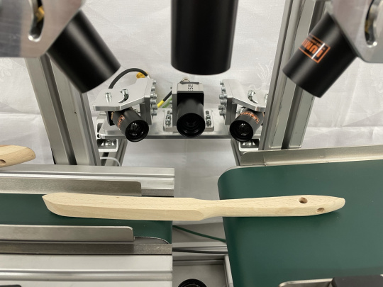 Multi-camera system for quality inspection of wooden parts