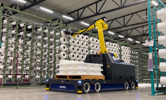 Autonomously driving robotic assistance system with Ensenso 3 D camera enables automated loading of creels with yarn spools.
