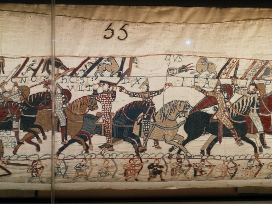Bayeux Tapestry with many horsemen