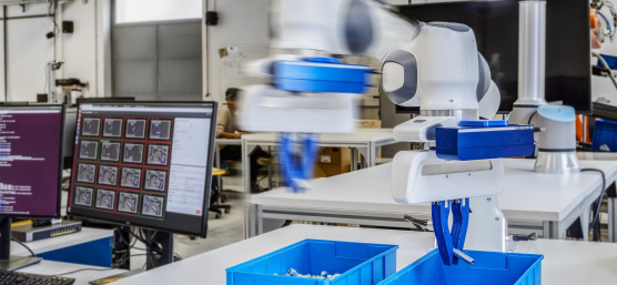 A fast-moving robotic arm with Ensenso cameras sorts screws