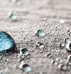 Close-up of a drop of water, symbolising a box with arrows.