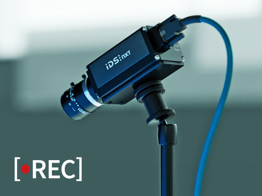 IDS NXT malibu camera on a tripod with REC font for recording