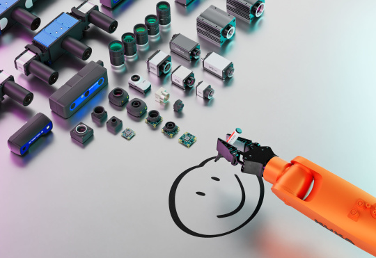 IDS camera range, in front of it a robot arm drawing a smiley face