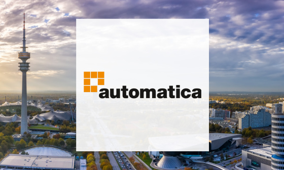Automatica logo in the foreground and aerial view of Munich in the background