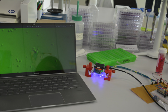 Fluorescence microscope with USB3 uEye XLE board level camera. The screen shows the captured cells.