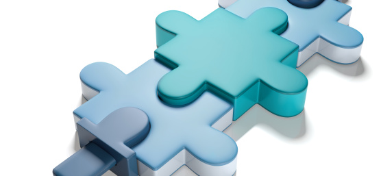 3 puzzle pieces connected at the bottom left with a cable