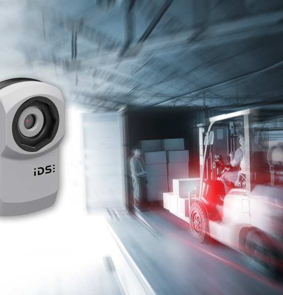 uEye XC camera hovers next to dynamic scene with forklift and truck.