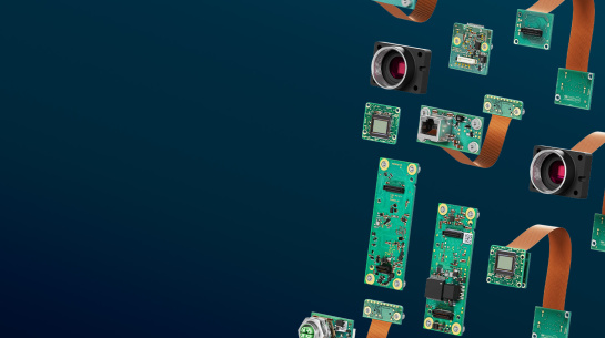 Various circuit boards and camera fronts on a dark background