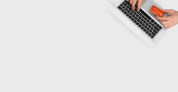 A laptop in which an employee is entering his credit card data.