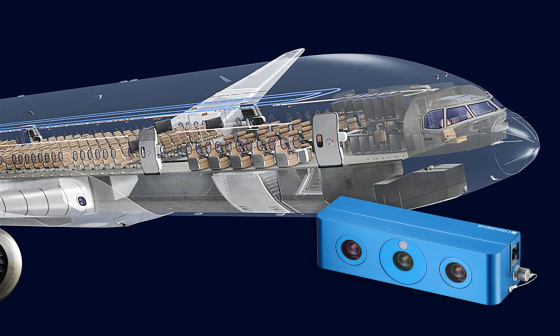 Front section of an aeroplane with a view into the cabin, with an Ensenso 3D camera in the foreground.