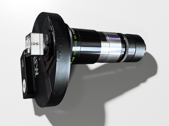 Camera, filter wheel and Barlow lens are screwed together and placed in the eyepiece socket of the telescope