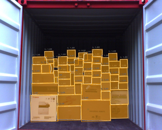 Loading area with various packages stacked on top of each other and their scale