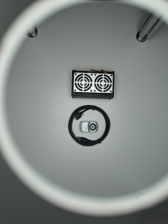 Edge computing module with uEye XC and cabling, from above through opening