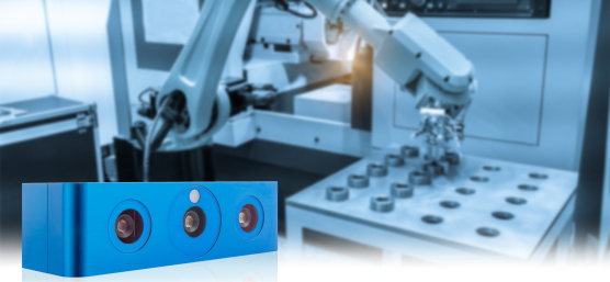 In the foreground, an Ensenso camera; in the background, a robot at work
